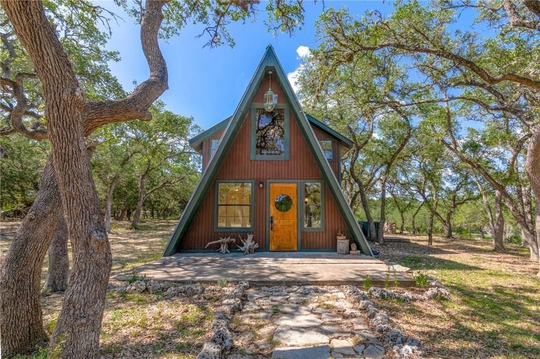 View 180 Link Ln in Inwood Forest East 180 Link Ln - front exterior - Luxury home in Inwood Forest East, Wimberley, TX