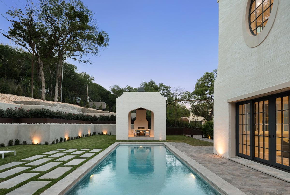 3802 Balcones Drive pool courtyard twilight