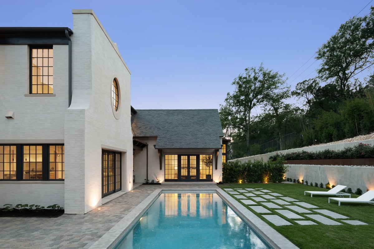 3802 Balcones Drive rear pool elevation dusk