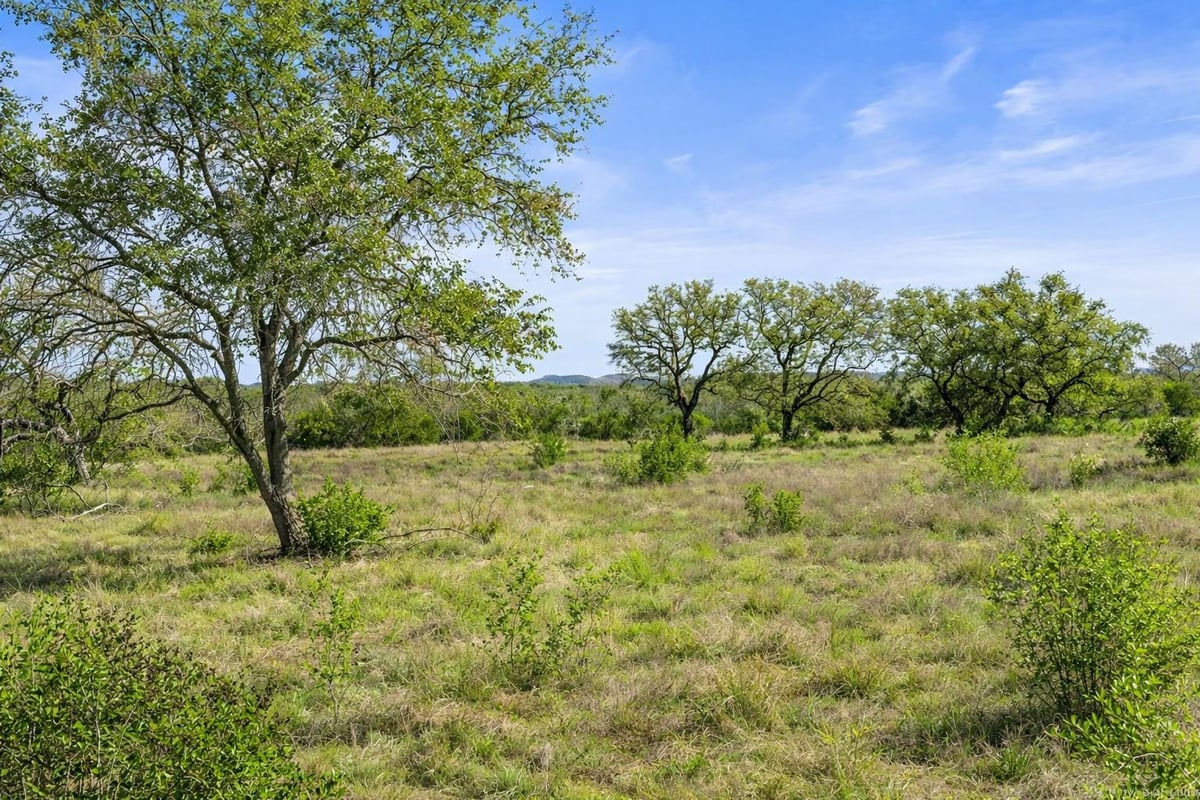 View 0 Live Oak Ranch Rnch in Flat Creek Ranches 0 Live Oak Ranch Rnch - front exterior - Luxury lot in Flat Creek Ranches, Johnson City, TX