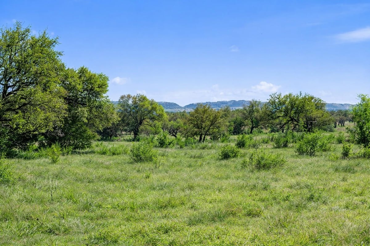 View 0 Lone Star Oak Rnch in Flat Creek Ranches 0 Lone Star Oak Rnch - front exterior - Luxury home in Flat Creek Ranches, Johnson City, TX