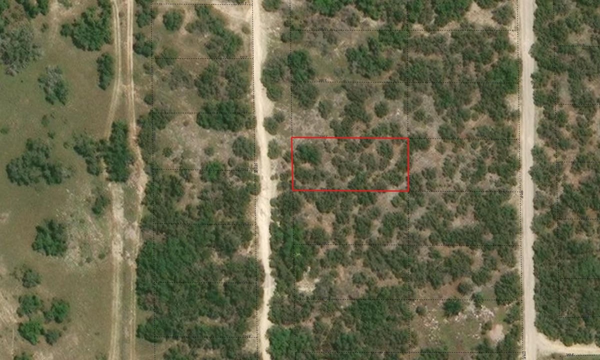 View 00 Cheyenne Trl in Woodcreek Sec 13 00 Cheyenne Trl - front exterior - Luxury lot in Woodcreek Sec 13, Wimberley, TX