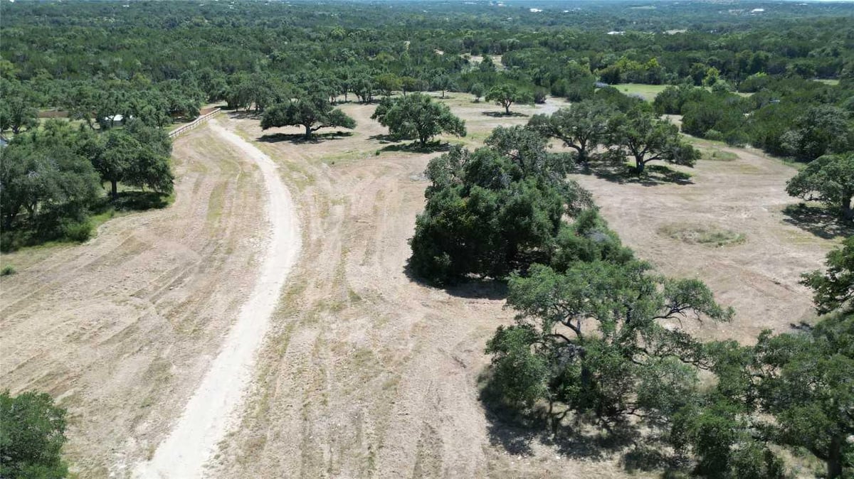 View 00 Redemption Ave in Medlin Creek Ranch Ph Iii 00 Redemption Ave - front exterior - Luxury lot in Medlin Creek Ranch Ph Iii, Dripping Springs, TX