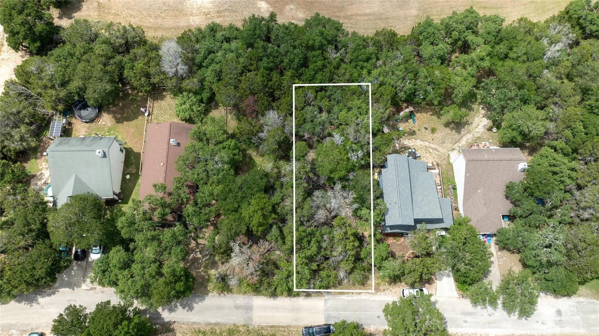 View 00 Wood Glen Dr in Woodcreek Sec 22 00 Wood Glen Dr - front exterior - Luxury lot in Woodcreek Sec 22, Wimberley, TX