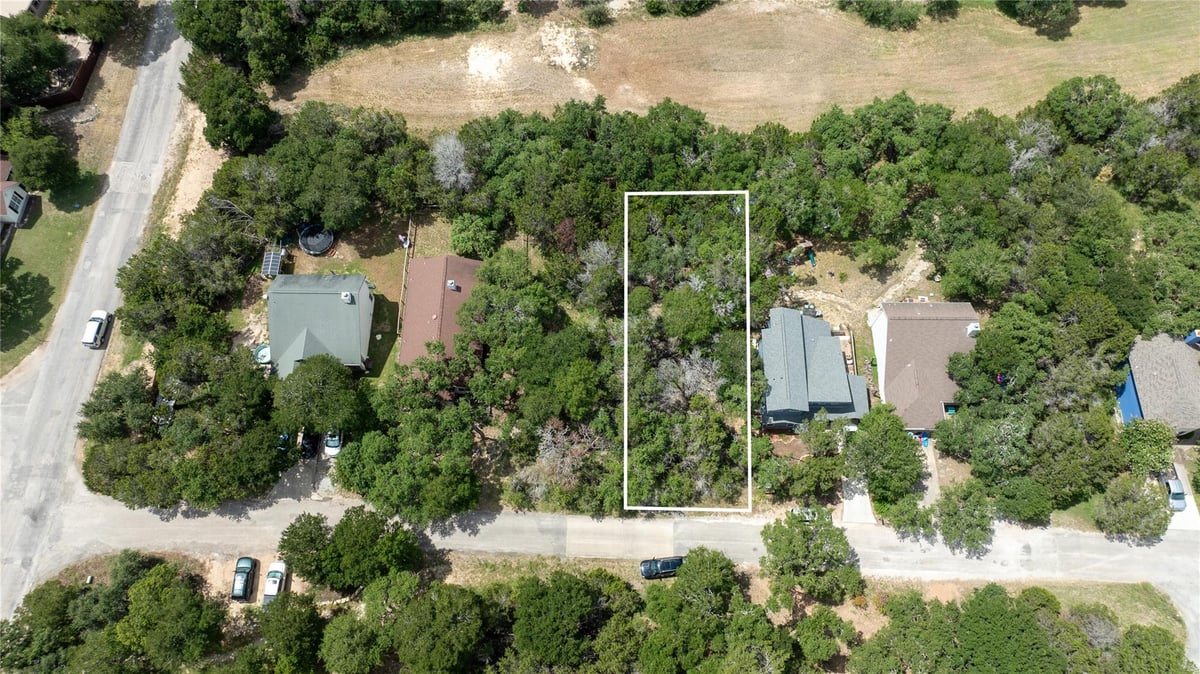 Primary bedroom at 00 Wood Glen Dr - Woodcreek Sec 22, Wimberley, TX
