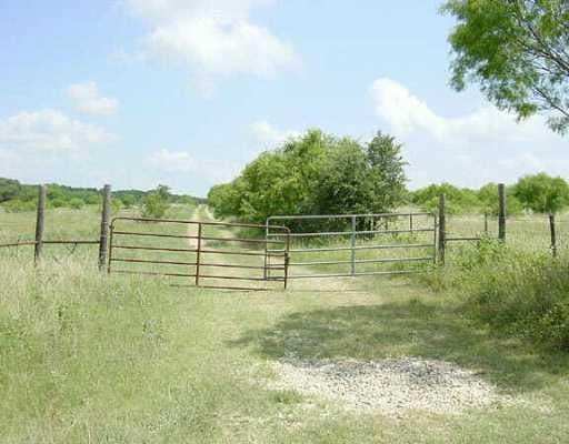 View 000 Old Kelly RD 000 Old Kelly RD - front exterior - Luxury home in Lockhart, TX
