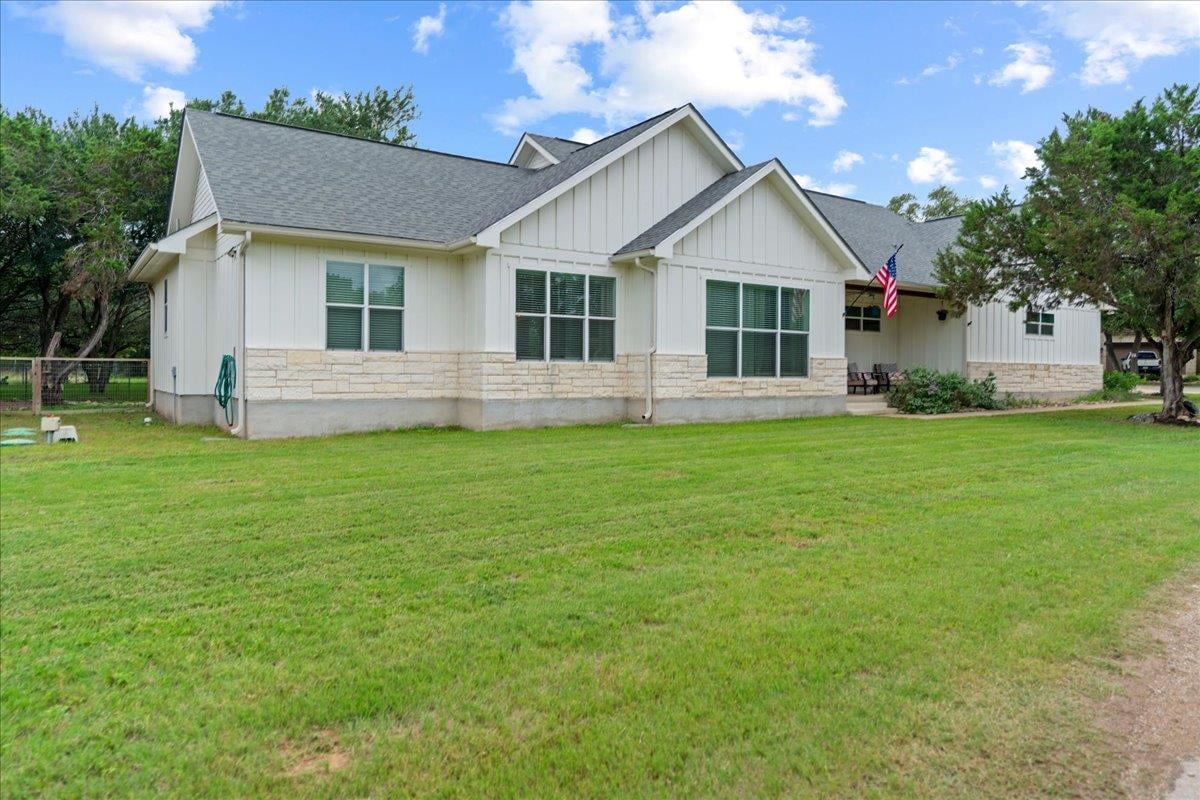 View 1 Agarita CIR in Woodcreek Sec 8 1 Agarita CIR - front exterior - Luxury home in Woodcreek Sec 8, Wimberley, TX