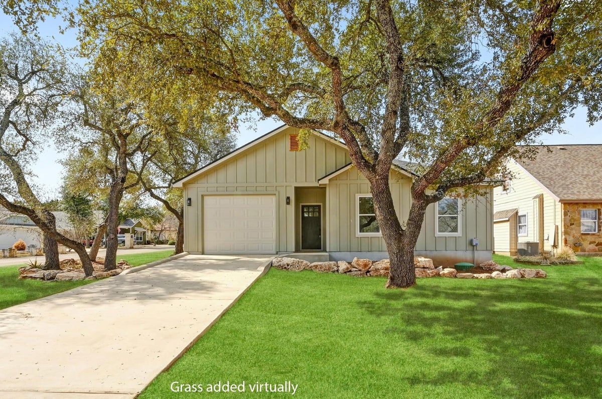 View 1 Happy Hollow Ln in Woodcreek Sec 9-A 1 Happy Hollow Ln - front exterior - Luxury home in Woodcreek Sec 9-A, Wimberley, TX
