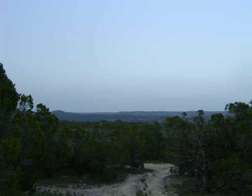 View 1 Post Oak Bend RD 1 Post Oak Bend RD - front exterior - Luxury home in Marble Falls, TX