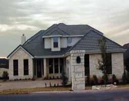 View 1 Tiburon Dr in HILLS OF LAKEWAY PHS 4 THE 1 Tiburon Dr - front exterior - Luxury home in HILLS OF LAKEWAY PHS 4 THE, Austin, TX