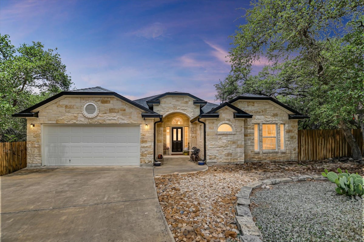 View 10 Caliche Ct in Woodcreek Sec 14 10 Caliche Ct - front exterior - Luxury home in Woodcreek Sec 14, Wimberley, TX