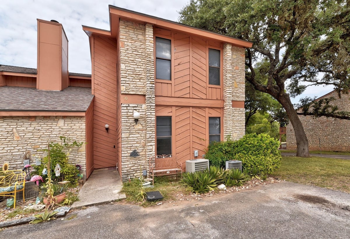View 10 Cypress Fairway Vlg in Cypress Fairway Village 1 10 Cypress Fairway Vlg - property photo 1 - Luxury home in Cypress Fairway Village 1, Wimberley, TX