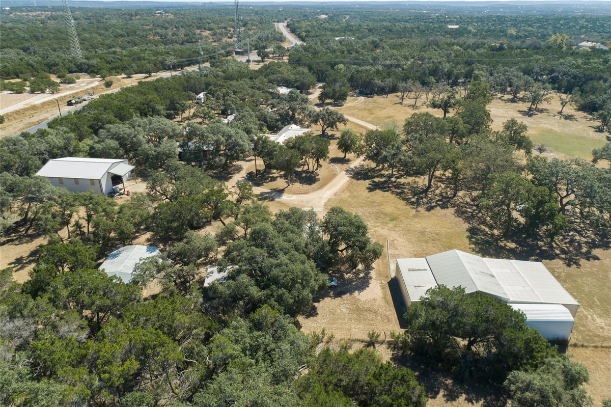 View 100 Burnett Ranch Rd in Burnett Ranch Sec 1 100 Burnett Ranch Rd - front exterior - Luxury home in Burnett Ranch Sec 1, Wimberley, TX