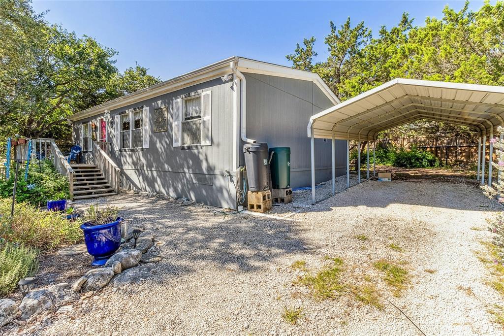View 100 Cowpoke CIR in Campfire 2 Sec 4 100 Cowpoke CIR - front exterior - Luxury home in Campfire 2 Sec 4, Wimberley, TX