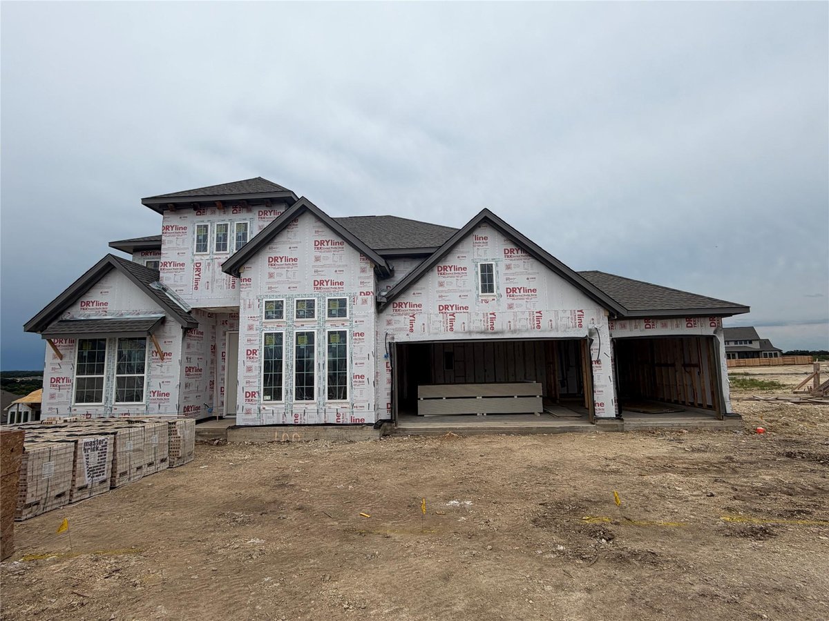 View 100 Uphill DR in Lariat 100 Uphill DR - front exterior - Luxury home in Lariat, Liberty Hill, TX