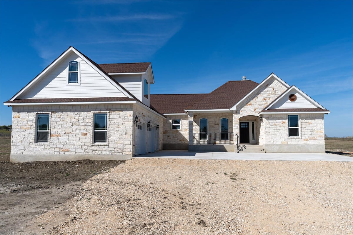 View 1000 Black Ankle Rd in Dollhouse Ranch 1000 Black Ankle Rd - front exterior - Luxury home in Dollhouse Ranch, Lockhart, TX
