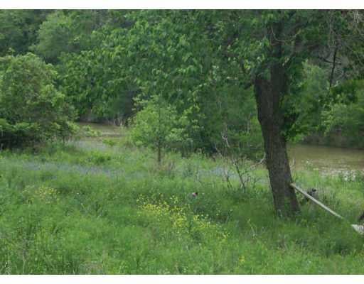 View 1000 River BLF 1000 River BLF - front exterior - Luxury lot in Wimberley, TX