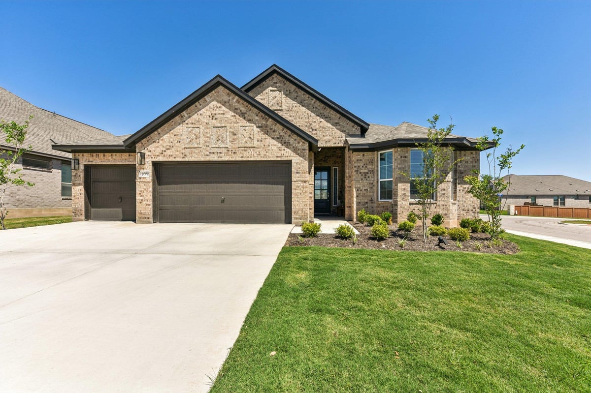 View 1000 Rollingwood Trl in Highland Village 1000 Rollingwood Trl - front exterior - Luxury home in Highland Village, Georgetown, TX