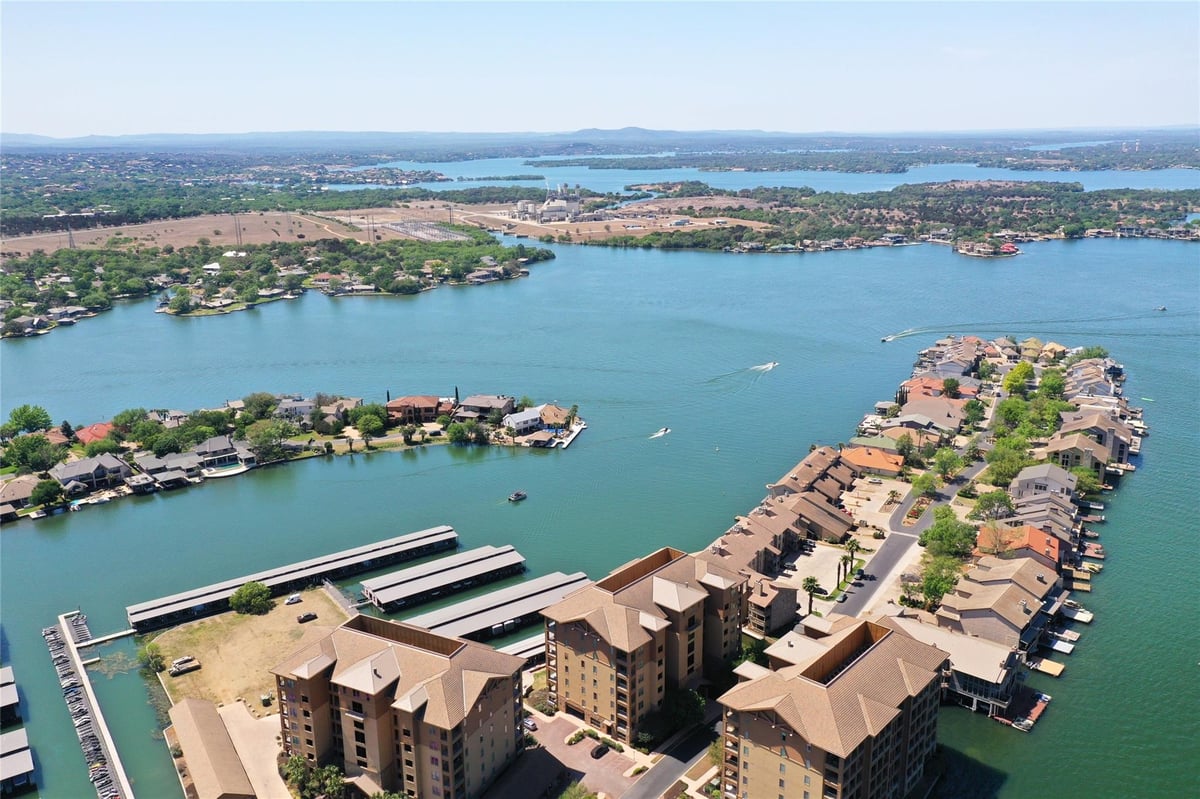 View 1000 The Cape Rd Unit #65 in The Waters At Horseshoe Bay 1000 The Cape Rd Unit #65 - front exterior - Luxury home in The Waters At Horseshoe Bay, Horseshoe Bay, TX