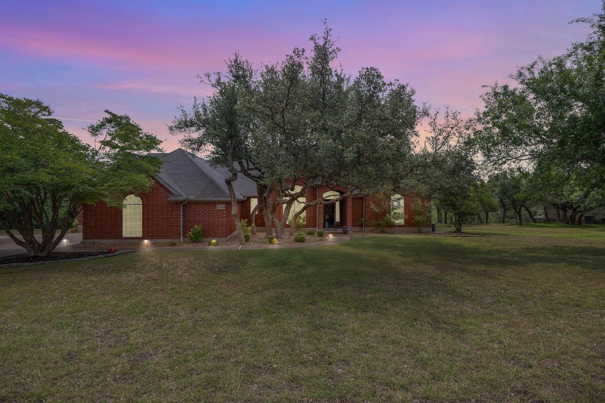 View 10003 Baxter LN in Scenic Brook Estates 10003 Baxter LN - property photo 1 - Luxury home in Scenic Brook Estates, Austin, TX