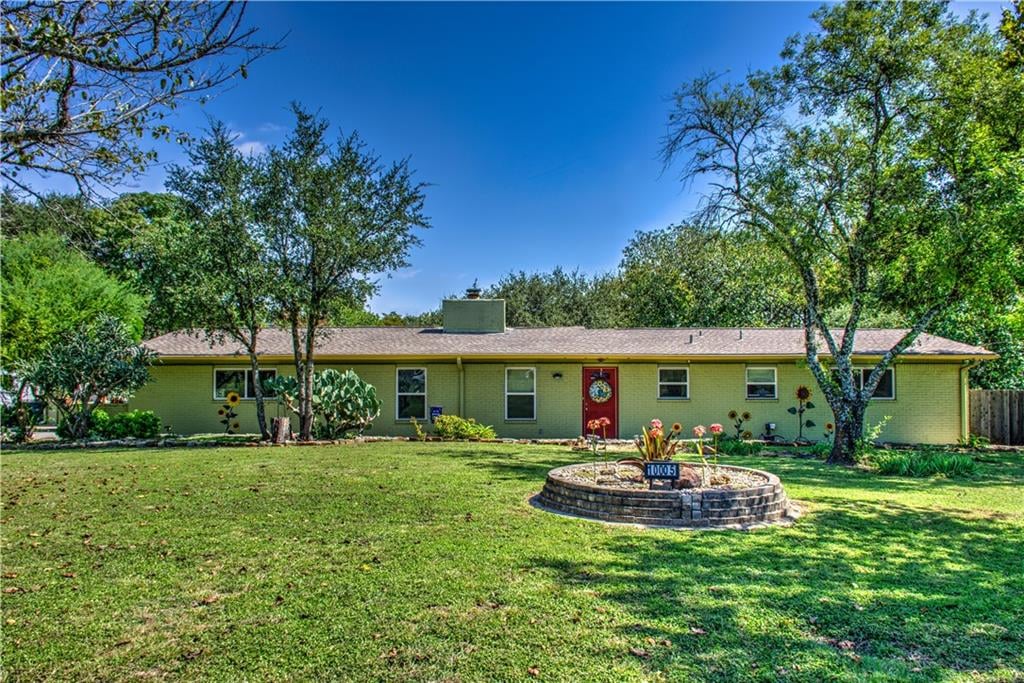 View 10005 Rocking Horse Rd in Palomino Park Sec 03 10005 Rocking Horse Rd - front exterior - Luxury home in Palomino Park Sec 03, Austin, TX