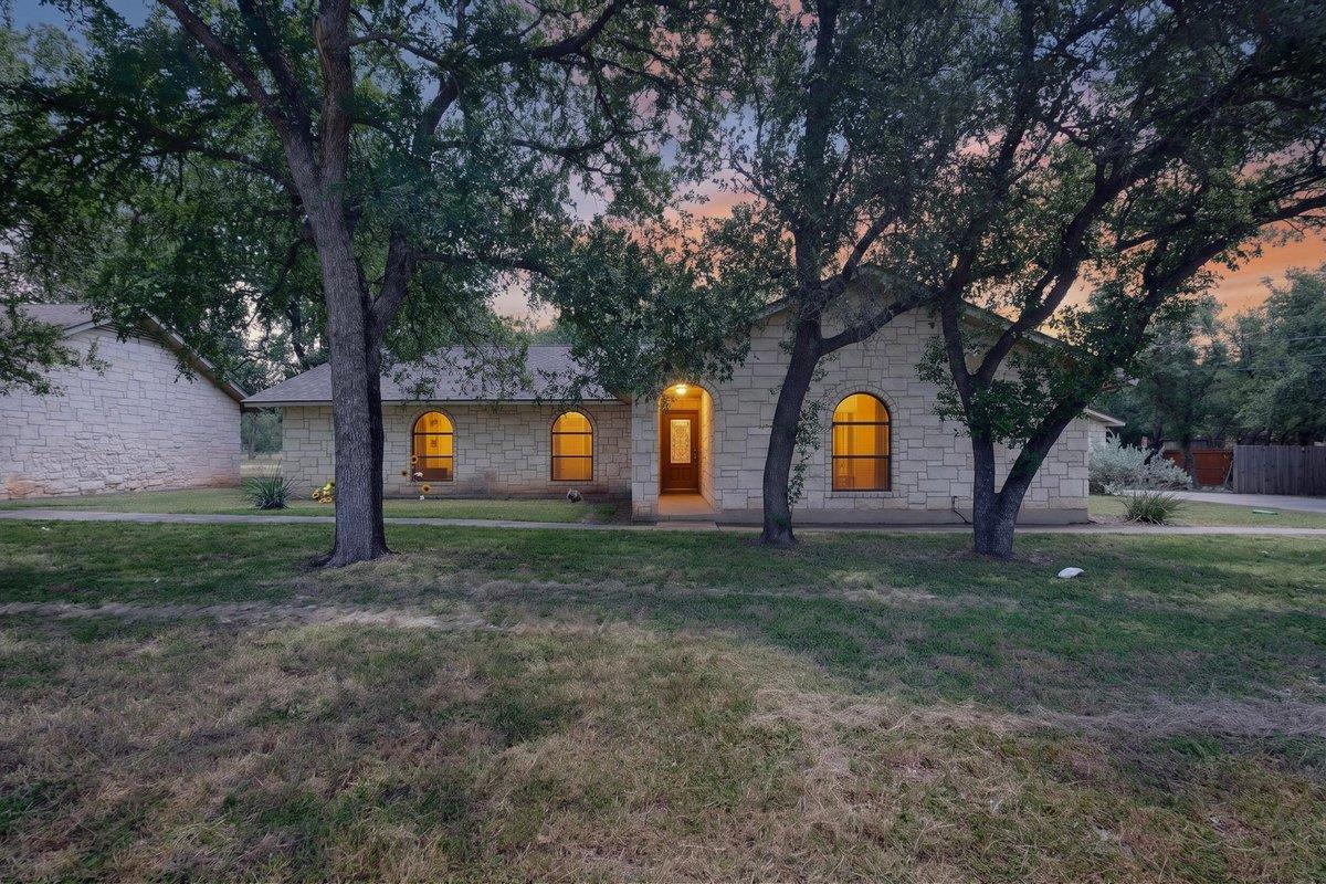 View 1002 Adventure LN in Whippoorwill 1002 Adventure LN - front exterior - Luxury home in Whippoorwill, Cedar Park, TX