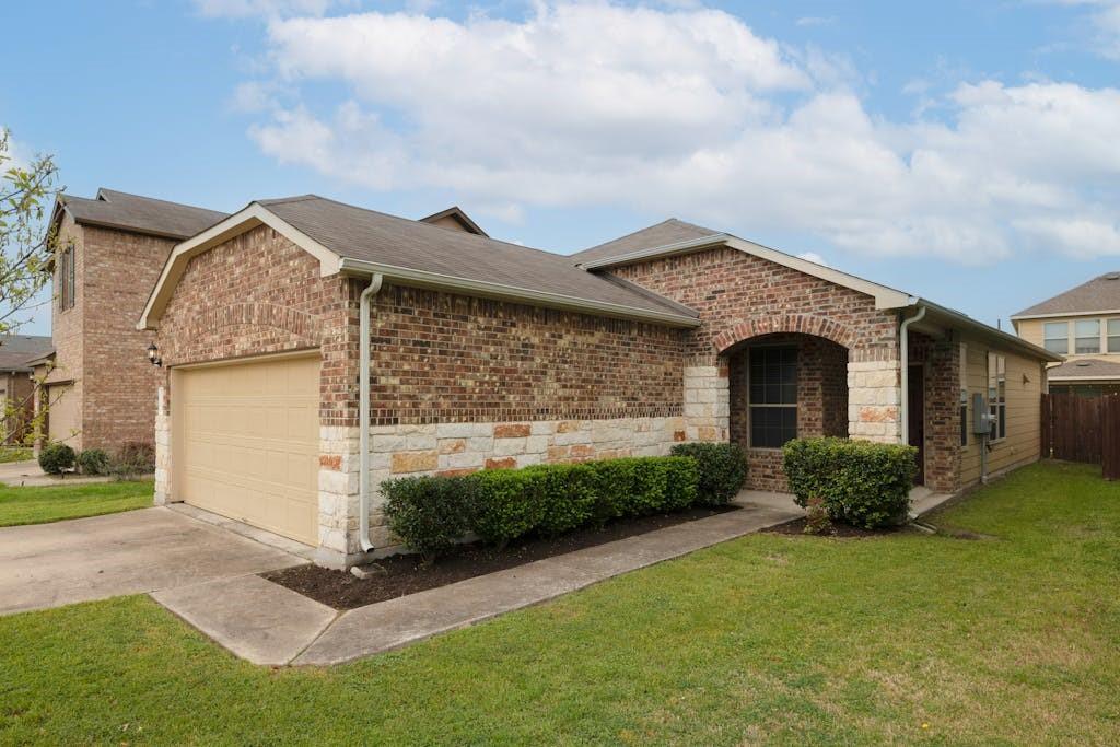 View 10028 Aly May Dr in Hollow At Slaughter Creek Sec 10028 Aly May Dr - front exterior - Luxury home in Hollow At Slaughter Creek Sec, Austin, TX