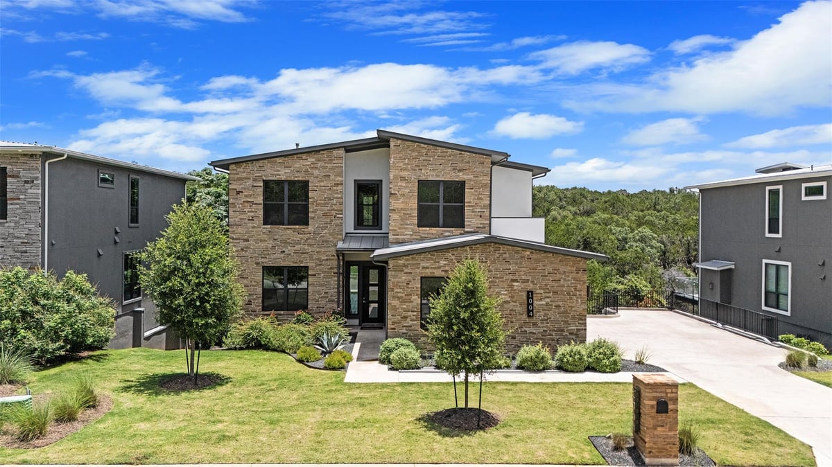 View 1004 Barrie DR in Cardinal Hills Unit 05 1004 Barrie DR - front exterior - Luxury home in Cardinal Hills Unit 05, Austin, TX