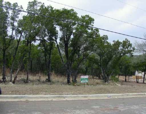 View 1004 Ogden Dr in AUSTIN LAKE HILLS SEC 2 1004 Ogden Dr - front exterior - Luxury lot in AUSTIN LAKE HILLS SEC 2, Austin, TX