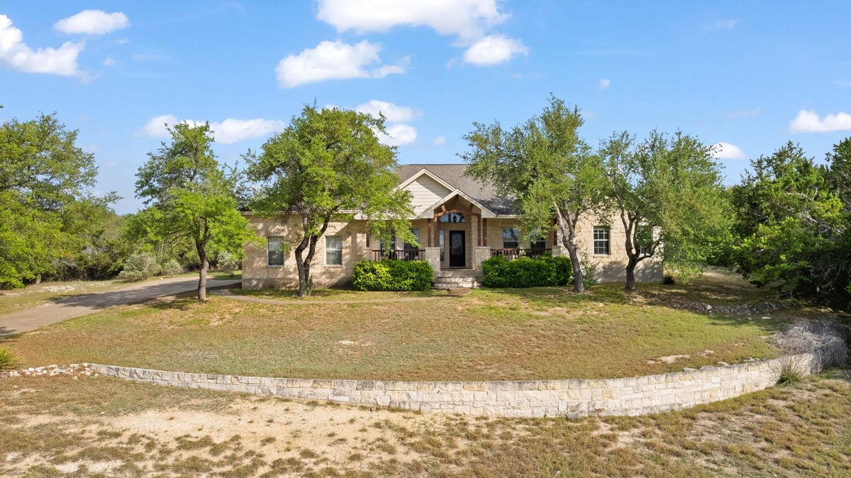 View 10045 W Cave Loop in West Cave Estates Sec 04 10045 W Cave Loop - front exterior - Luxury home in West Cave Estates Sec 04, Dripping Springs, TX