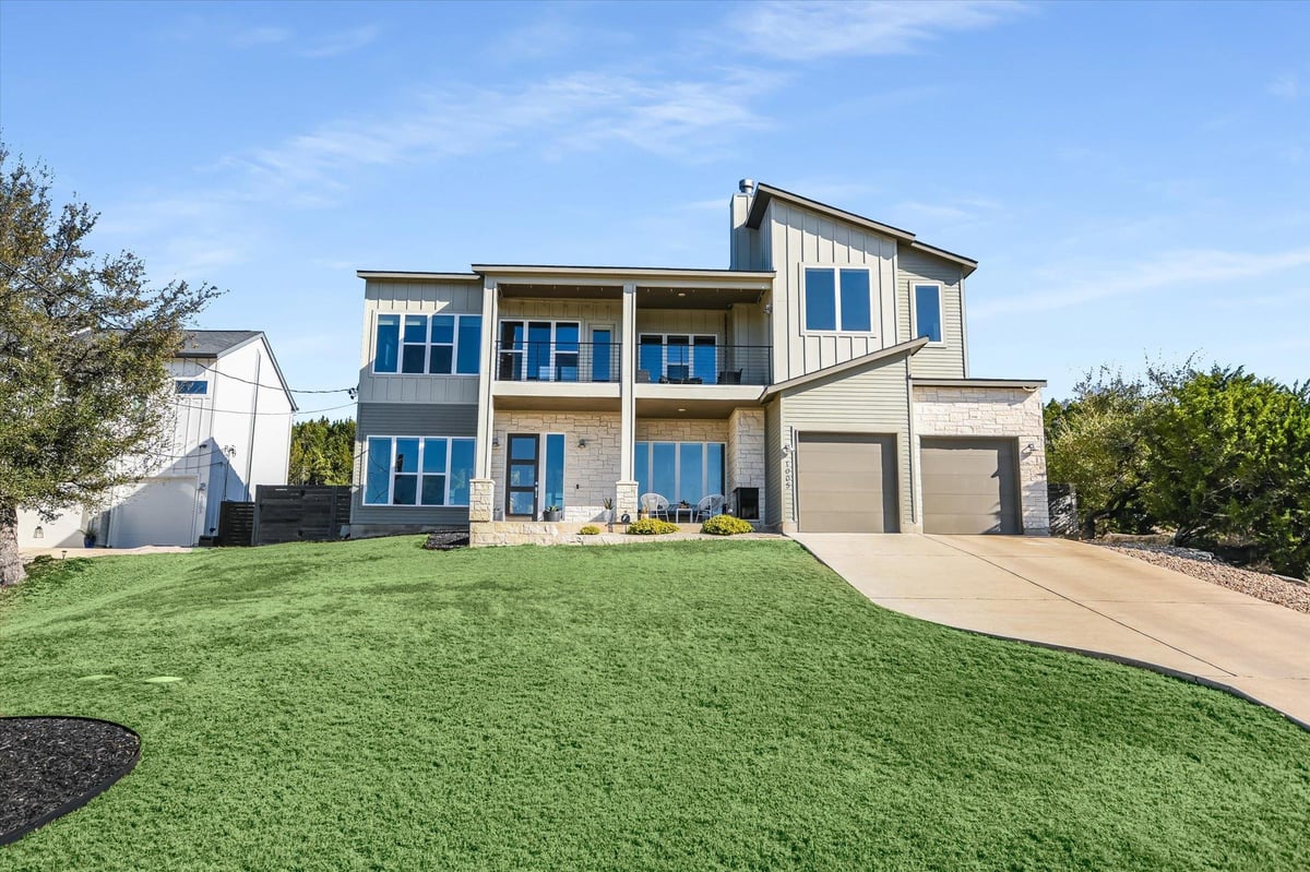 View 1005 Larkhall Dr in Briarcliff Inc Sec 14 1005 Larkhall Dr - front exterior - Luxury home in Briarcliff Inc Sec 14, Spicewood, TX