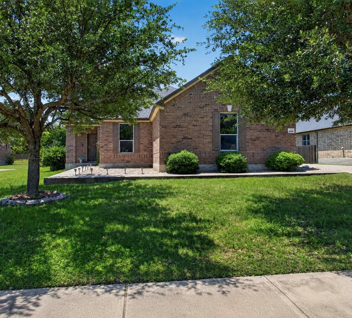 View 1005 Lonesome Lilly WAY in Spring Trails Ph 3 1005 Lonesome Lilly WAY - front exterior - Luxury home in Spring Trails Ph 3, Pflugerville, TX