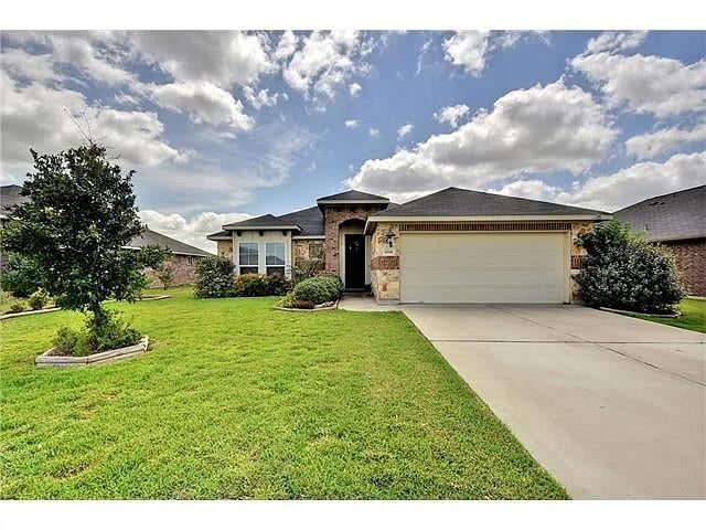 View 1008 Blackman CT in Legends Of Hutto Ph 5b 1008 Blackman CT - front exterior - Luxury home in Legends Of Hutto Ph 5b, Hutto, TX