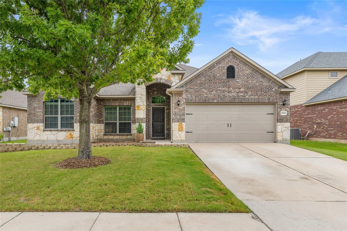 View 1008 N Ash CV in Emory Farms Sec 01 1008 N Ash CV - front exterior - Luxury home in Emory Farms Sec 01, Hutto, TX