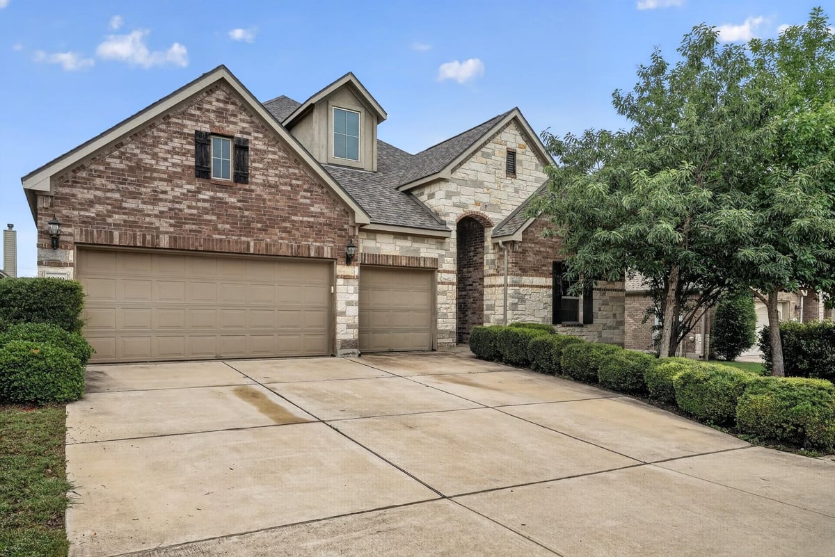 1009 Wolcott DR - front exterior - Luxury home in Savanna Ranch, Leander, TX