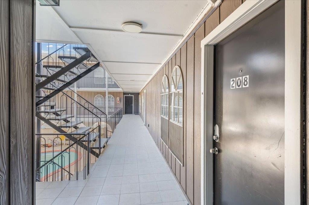 Living area at 101 E 33rd St Unit #208 - 3 bed 2 bath home