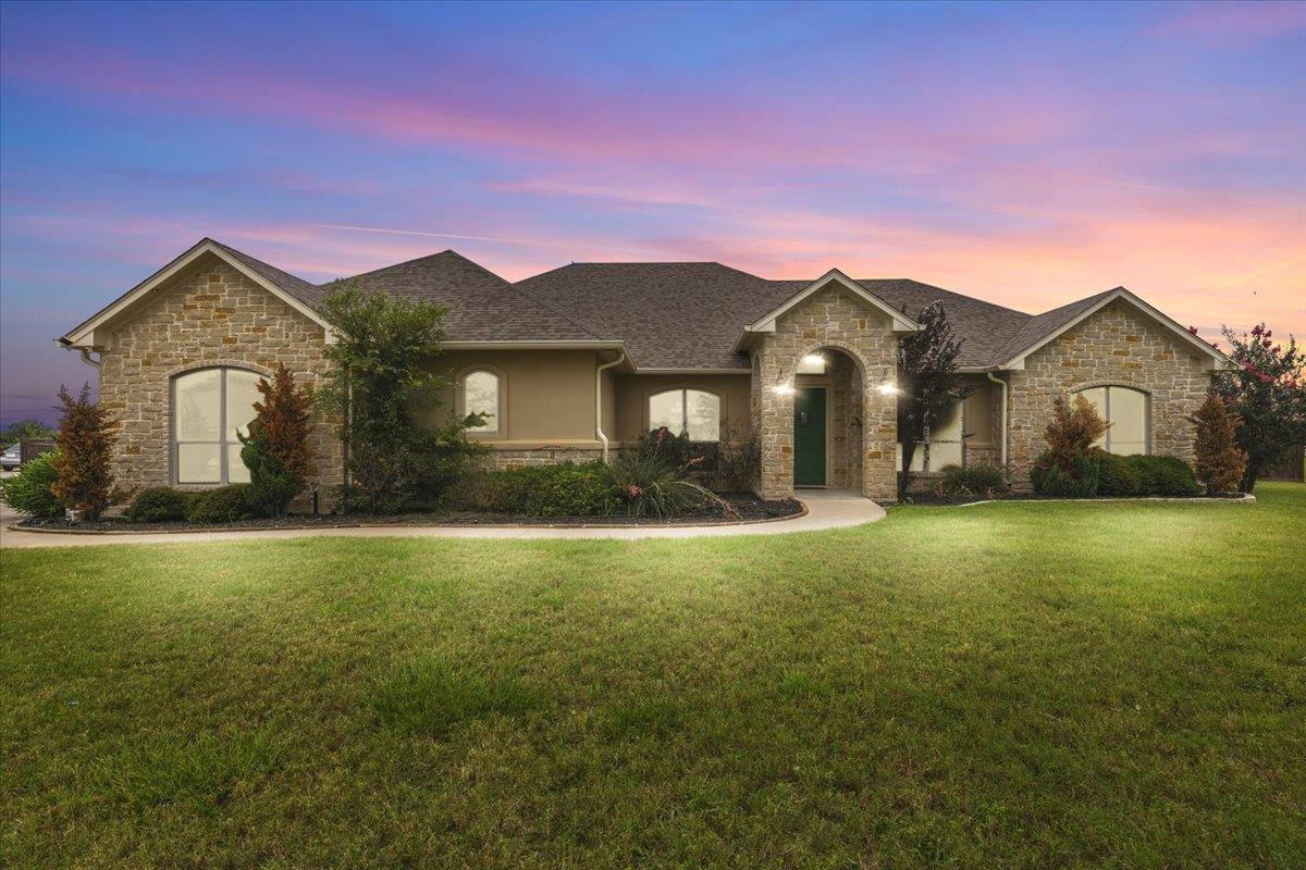 View 101 Eland Ave in Cassena Ranch 101 Eland Ave - front exterior - Luxury home in Cassena Ranch, Bastrop, TX
