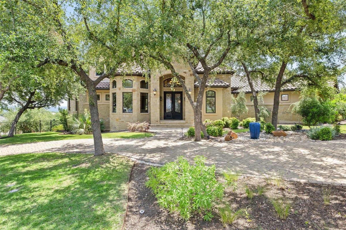 101 Hidden Hills Cv - front exterior - Luxury home in Barton Creek Lakeside, Spicewood, TX