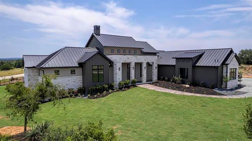 View 101 Meadow Beauty in Summit Rock 101 Meadow Beauty - front exterior - Luxury home in Summit Rock, Horseshoe Bay, TX