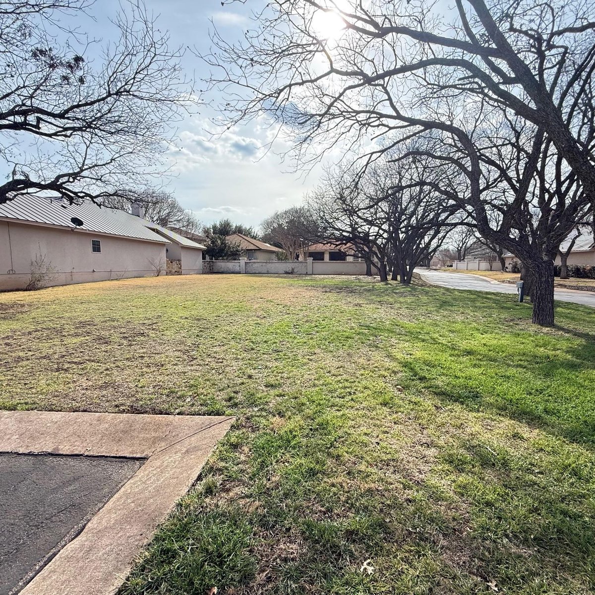 View 101 Menard Ct in Pecan Creek 101 Menard Ct - front exterior - Luxury lot in Pecan Creek, Horseshoe Bay, TX