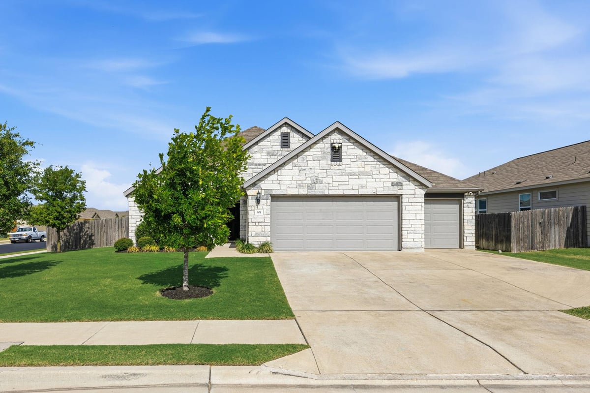 View 101 Ozark DR in Hutto Highlands 101 Ozark DR - front exterior - Luxury home in Hutto Highlands, Hutto, TX