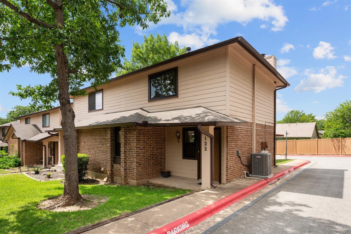 View 101 S Clearday DR Unit #122 in Woodmere Condo 101 S Clearday DR Unit #122 - front exterior - Luxury home in Woodmere Condo, Austin, TX