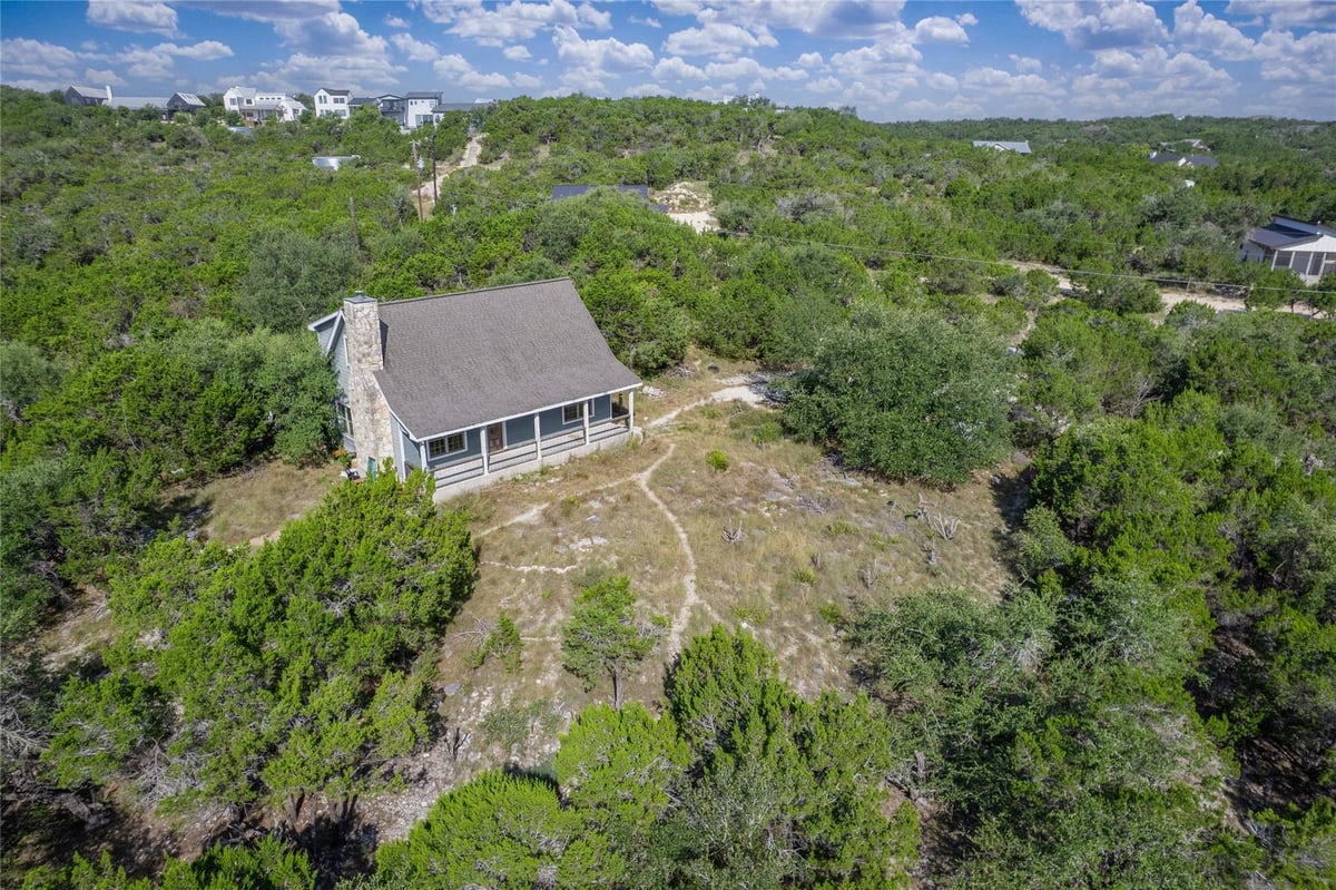 View 101 Twin Creek CIR in Hill Creek West 101 Twin Creek CIR - front exterior - Luxury home in Hill Creek West, Dripping Springs, TX
