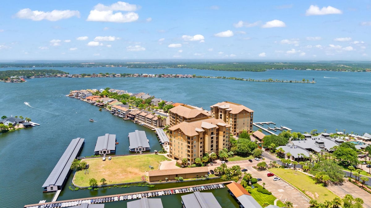 View 101 West Bank Unit #33 in The Waters At Horseshoe Bay Re 101 West Bank Unit #33 - front exterior - Luxury home in The Waters At Horseshoe Bay Re, Horseshoe Bay, TX