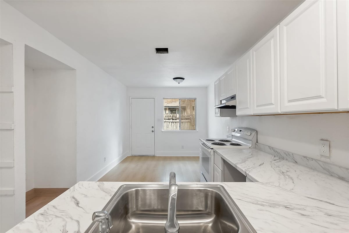 View 1010 N Bird Creek DR Unit #A in Quail Valley Sec 01 1010 N Bird Creek DR Unit #A - property photo 1 - Luxury home in Quail Valley Sec 01, Austin, TX