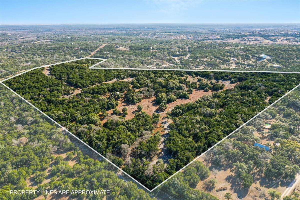 View 10107 Davy Crockett Dr in Silver Spur Ranchettes Sec 2 10107 Davy Crockett Dr - aerial view with 10107 Davy Crockett Dr in Dripping Sprin - Luxury home in Silver Spur Ranchettes...