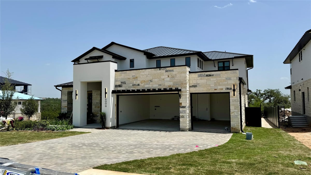 View 10107 Milky Way Dr in River Place 10107 Milky Way Dr - front exterior - Luxury home in River Place, Austin, TX
