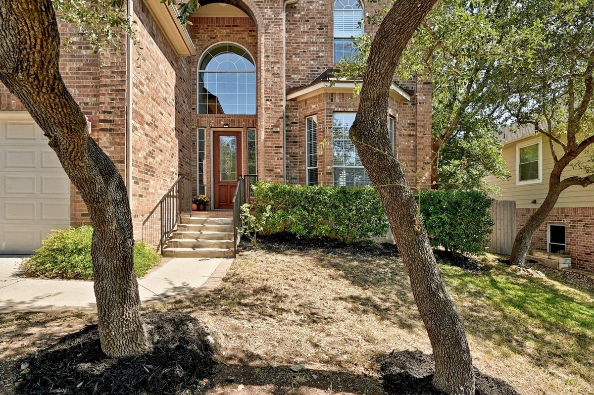 View 10109 Chestnut Ridge Rd in Canyon Creek Sec 28 10109 Chestnut Ridge Rd - front exterior - Luxury home in Canyon Creek Sec 28, Austin, TX