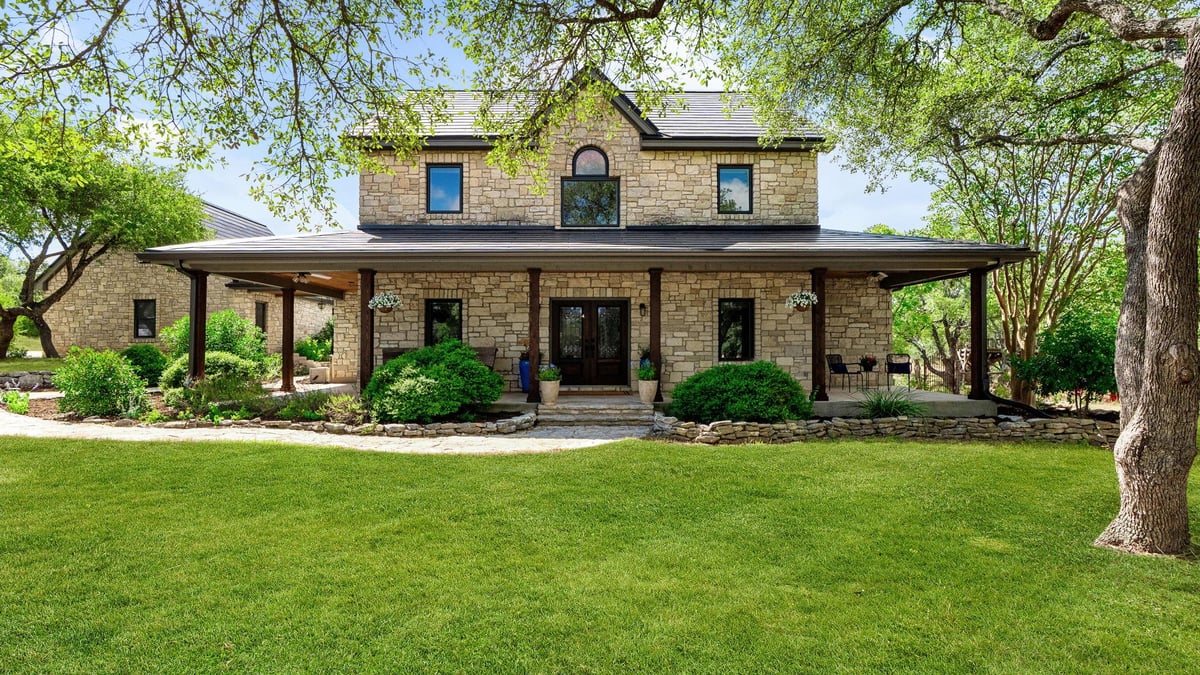 View 1011 Oak Meadow Dr in Sunset Canyon Sec V 1011 Oak Meadow Dr - front exterior - Luxury home in Sunset Canyon Sec V, Dripping Springs, TX