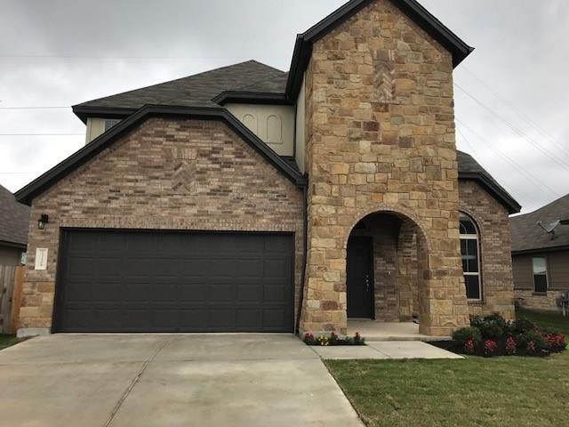 View 1012 Goldilocks Ln in Hills of Bear Creek 1012 Goldilocks Ln - front exterior - Luxury home in Hills of Bear Creek, Austin, TX